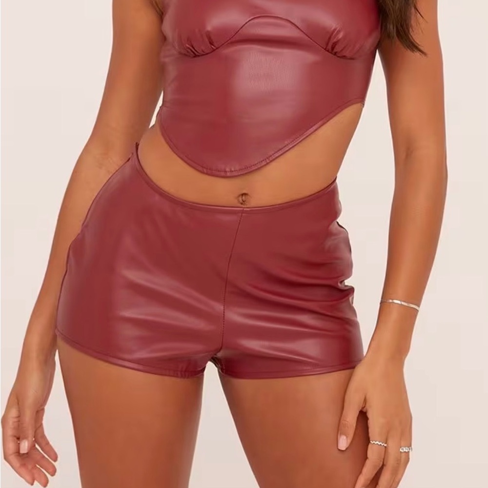 Curved Waistband Shorts In Burgundy Faux Leather